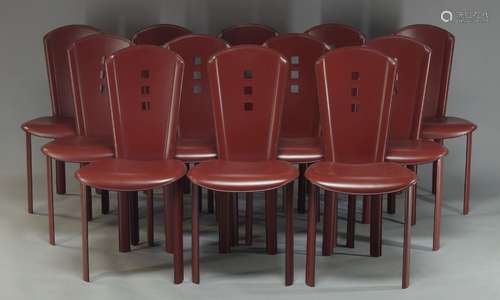 A set of modern red leather chairs by Quia, Italy, retailed by Harrods, c.2000, with pierced