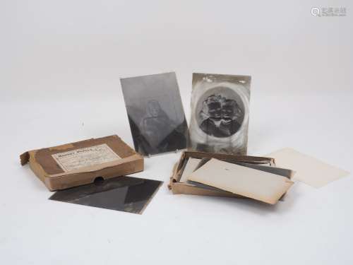 A collection of glass photographic plates, 20th century, attributed to M. Adams, depicting