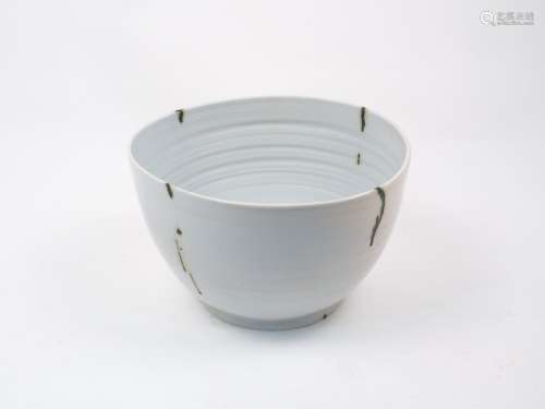 Mark Katzenellenbogen, a porcelain bowl with transparent glaze and silver metal overglaze, the