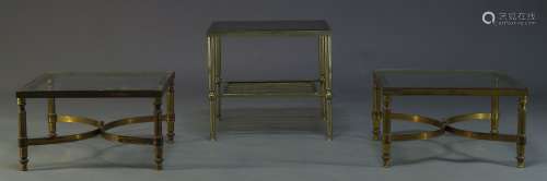 A pair of brass side tables, c.1960, the square glass tops on cylindrical supports joined by x-