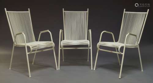 A set of three white painted garden chairs by Homa, Denmark, c.1970, the tubular steel frames with