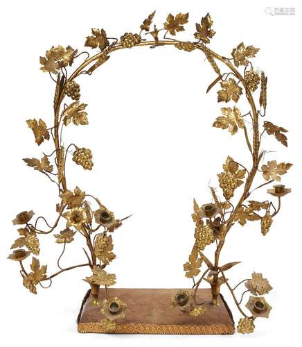 A large Italian eight-light gilt-bronze centrepiece, early 20th century, the arched frame with