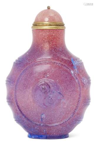 A Chinese pink glass snuff bottle, early 20th century, carved in low relief to each side with a