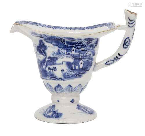 A Chinese porcelain helmet-shaped ewer, Qianlong period, painted in underglaze blue to the body with