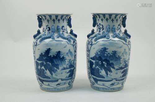 A pair of Chinese porcelain baluster vases, late 20th century, painted in underglaze blue with