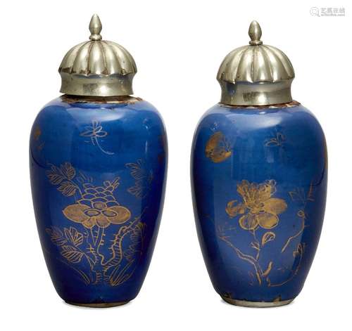 A pair of Chinese small powder blue ground vases, Kangxi period, painted in gilt with butterflies