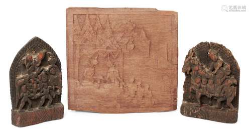 A matched pair of Indian carved wood plaques, each depicting narrative processions, one relief