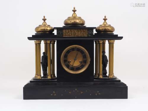 A French gilt metal and slate mantle clock, 19th century, of architectural form with three ogee form