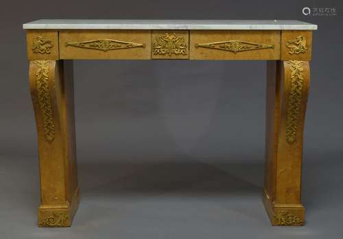 A French Empire style burr walnut and ormolu mounted console table, late 19th, early 20th Century,