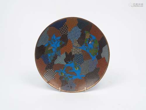 A Modern Japanese style cloisonné enamel dish, of circular form, designed with panels of floral