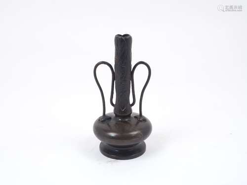 A Chinese bronze bottle vase, 20th century, with rounded body terminating with a cylindrical neck