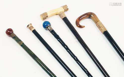 A group of five walking canes, late 19th / early 20th century, to include an ebonised example with