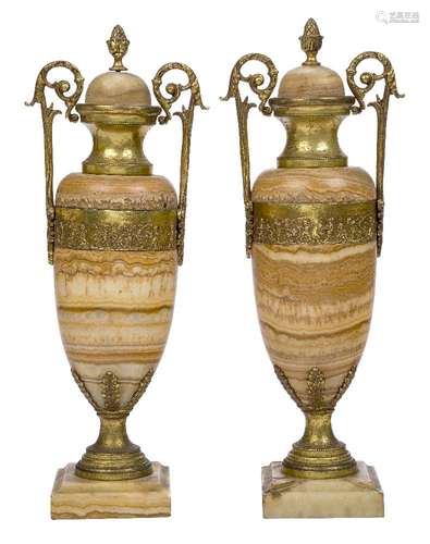 A pair of Italian gilt-metal mounted alabastro fiorito urns and covers, late 19th century, each with