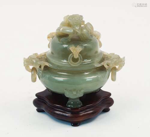 A jadeite carved censer and cover, with dragon form finial and three ringlets to the cover, and