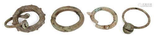 Five Chinese bronze bracelets, Neolithic period, one with chevron design, two cast with bells, 4.5cm