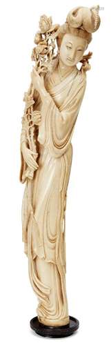 A large Chinese ivory tusk carving, 19th century, carved as The Queen Mother of The West (