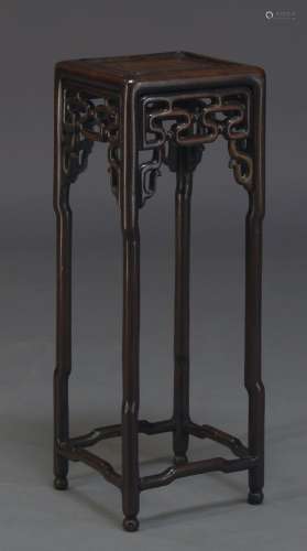 A Chinese hardwood jardiniere stand, 20th Century, the square rounded top, above pierced frieze on