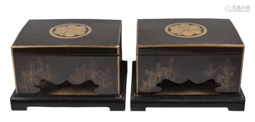 A pair of Japanese lacquered rectangular boxes, 19th century, decorated with floral motifs, each