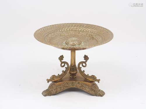 A 20th century brass comport, the bowl with stylised decoration featuring a floral motif band,