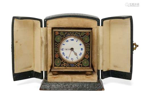 A Zenith travelling alarm clock, early 20th century, of square form, the metal body with enamelled