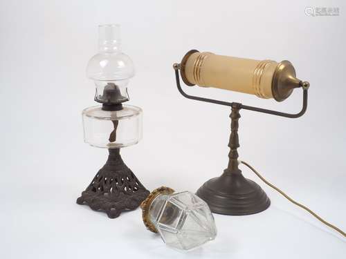 A desk lamp, c. 1930, designed as a cylindrical glass light rod, with gilt highlights, raised on