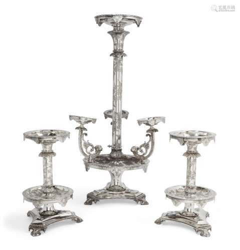 An impressive silver plated three part table centrepiece, comprising: a central ornament designed