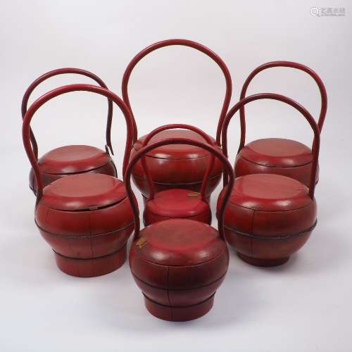 A group of Chinese wood and lacquer baskets, late 19th / 20th century, to include seven occasional