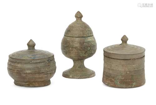 Three Chinese bronze miniature votive covered vessels, Late Six dynasties - Early Tang dynasty,