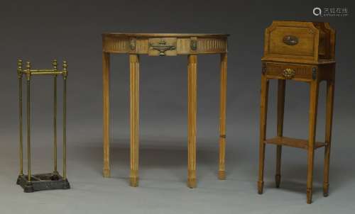 A pine demi lune side table, late 20th Century, the frieze with centred by carved vase and flanked