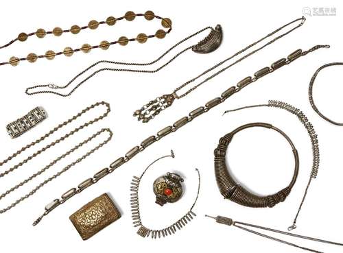 A large collection of Tibetan, Indian and African white metal jewellery, to include: A Kutch neck