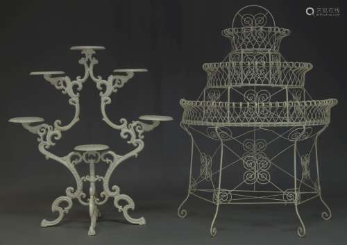 A white-painted cast-iron jardinière stand, second half 20th Century, of scrolled openwork form with