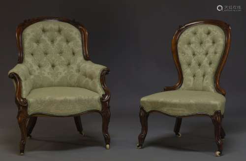 A Victorian mahogany and upholstered gentleman's armchair together with matching ladies chair,