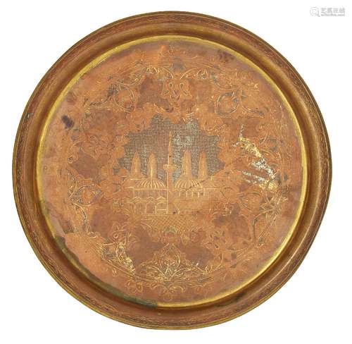 An Ottoman tombak tray, Turkey, circa 1900, of circular form, with raised rounded rim, incised