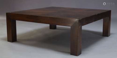 A modern Chinese stained elm coffee table, late 20th Century, the square top on square supports,