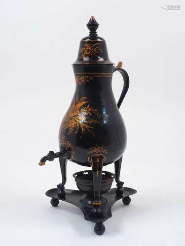 A tin samovar on tripod feet with cover, handle and spout, with gilt decorative features to the