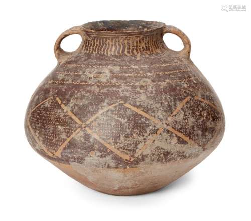 A Chinese pottery jar, Neolithic period, Majiayao culture, the top half reverse-slip decorated