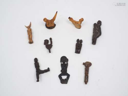 A collection of tribal interest small wood and bone carvings, early 20th century and later, of