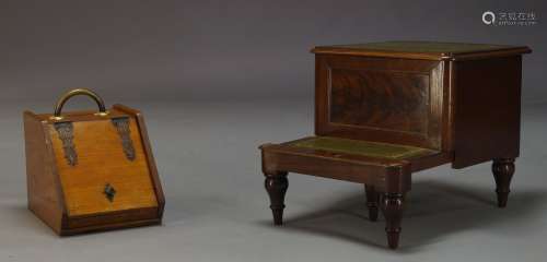 A Victorian set of mahogany bed steps, each step inset with green leather, raised on turned and