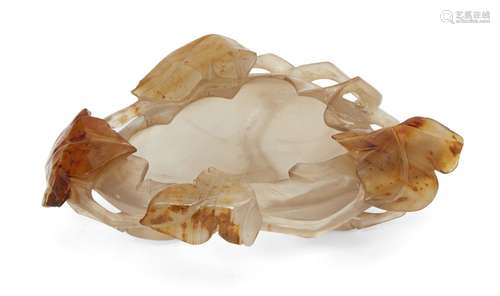 A Chinese agate brushwasher, late 19th century, the whole carved as a leaf with four smaller