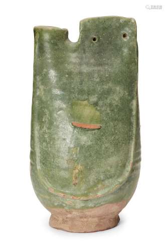 A Chinese pottery green-glazed flask, Liao dynasty, with single lug handle pierced with two holes,