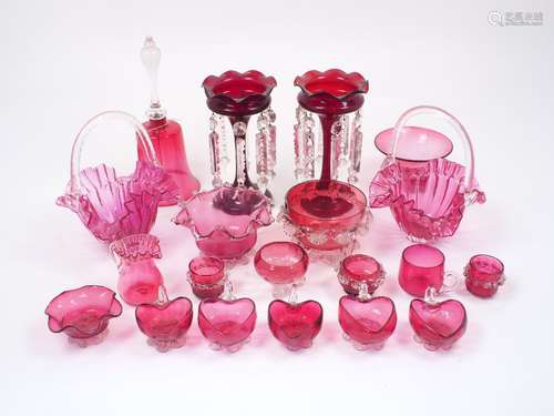 A quantity of cranberry glass pieces, 20th Century, to include five heart shaped cups, a pair of