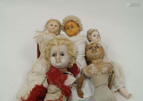 A collection of five wax over composition dolls, 19th century and later, to include: a long haired