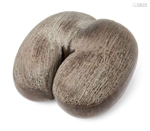 A coco de mer nut, 32cm x 29cm Provenance: Werner Forman (1921-2010) CollectionA coco de mer nut,