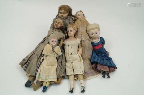 A selection of six wax over composition dolls, 19th century and later, to include: a moulded