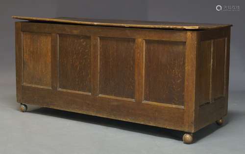 A George III style four panel blanket box, first half 20th Century, the hinged triple plank lid,