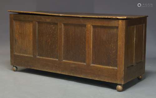 A George III style four panel blanket box, first half 20th Century, the hinged triple plank lid,