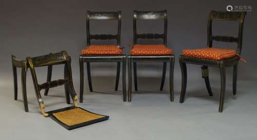 A set of four Regency style black Japanned and parcel gilt dining chairs, late 19th, early 20th