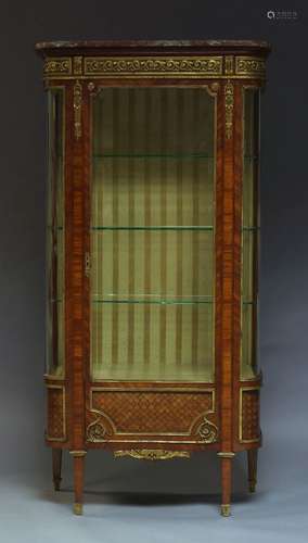 A French kingwood, parquetry and gilt metal mounted vitrine, 19th Century, the top with red and