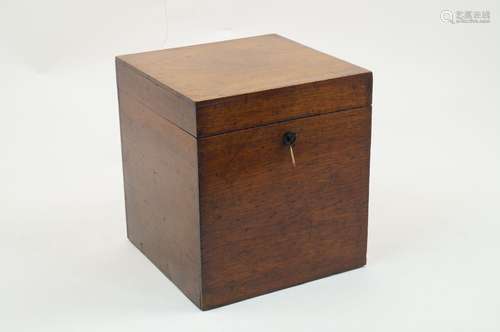 An George III mahogany cellarette, of square form, hinged cover revealing metal lined interior,