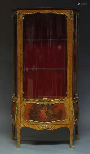 A French kingwood and ormolu mounted serpentine vitrine, 19th Century, with single glazed door